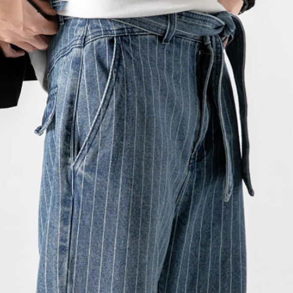 Loose denim trousers with belt and pockets