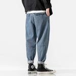 Load image into Gallery viewer, Loose denim trousers with belt and pockets
