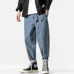 Load image into Gallery viewer, Loose denim trousers with belt and pockets
